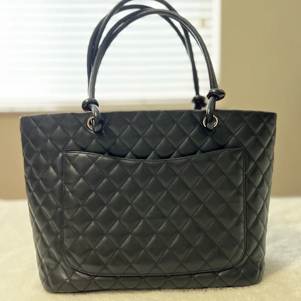 CHANEL Black Quilted Leather Shoulder Tote with White CC Emblem